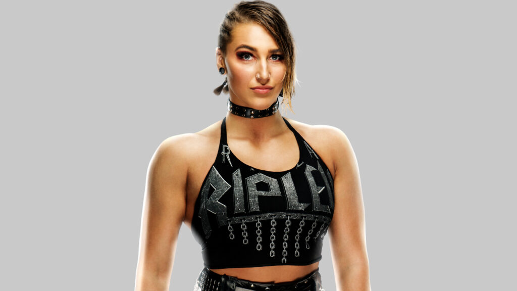 Rhea Ripley is a true powerhouse in the WWE. She's known for her impressive strength and her striking appearance.